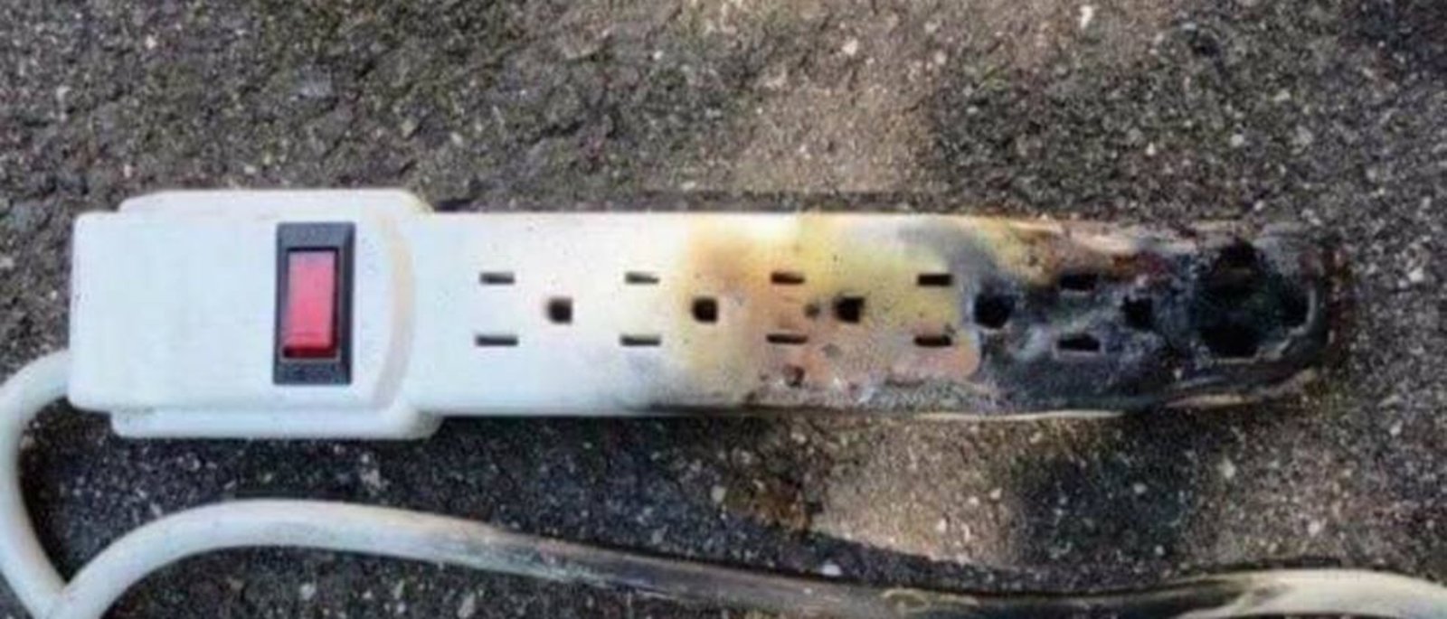 Melted_power_strip A melted power strip due to a space heater being plugged in